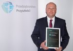 Dyrektor Biura Zarządu PCO S.A. Maciej Pędzich_nagroda Przedsiębiorstwo Przyszłości dla PCO S.A.jpg